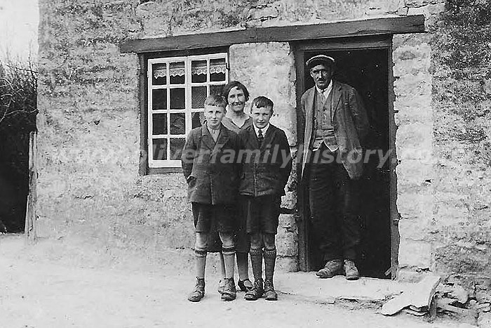 Circa early 1930's. This is May (Oliver, b.1888) and Tom Harris with their twin sons Bernard and HenryMay and Tom were parents-in-law of Rene Harris, the wife of Bernard, Rene still lives in Stonesfield today.